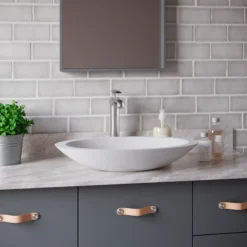 Karran Quattro 23" x 13.25" Oval Vessel Acrylic Solid Surface ADA Bathroom Sink with Stainless Steel Faucet and Accessories, White, QM160WH412SS